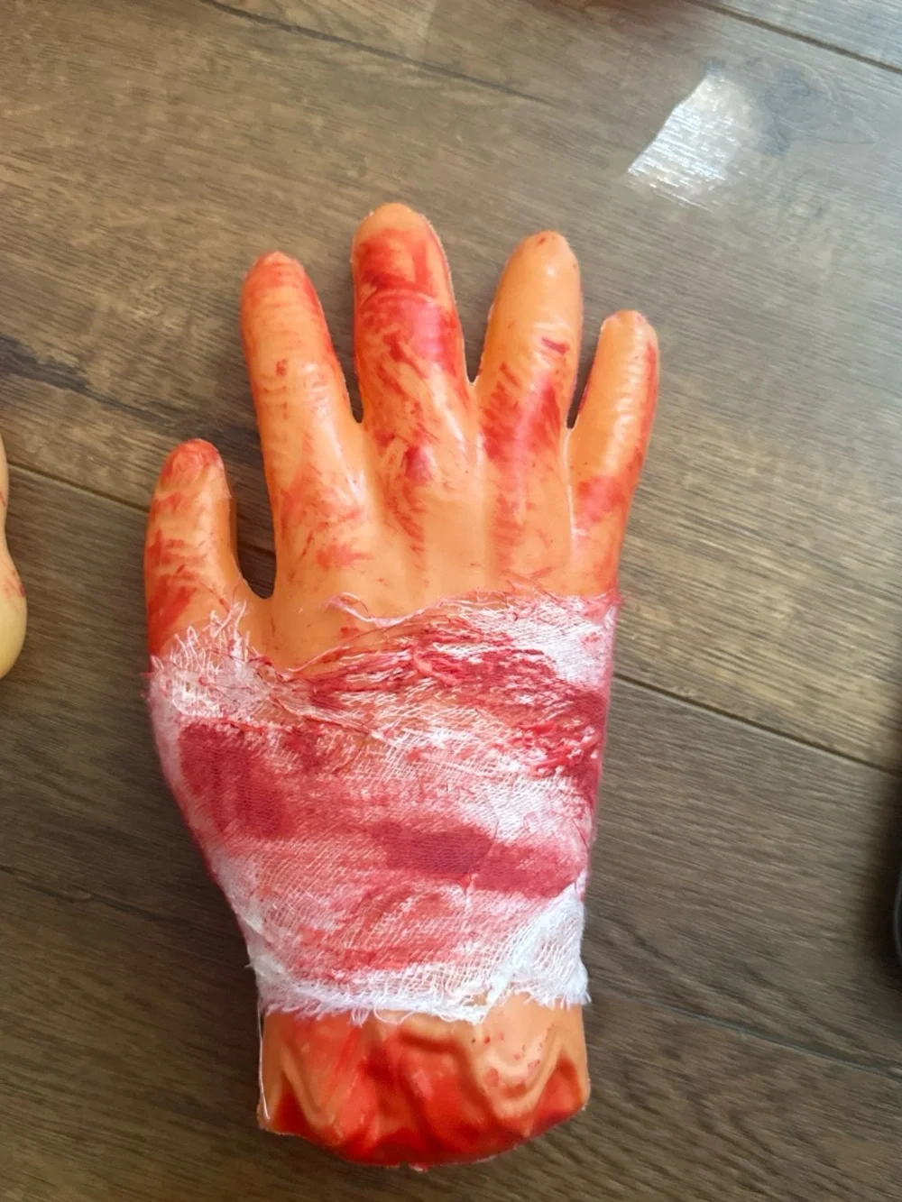 Fake Severed Hand and Foot Halloween Props - Bloody Orange Set